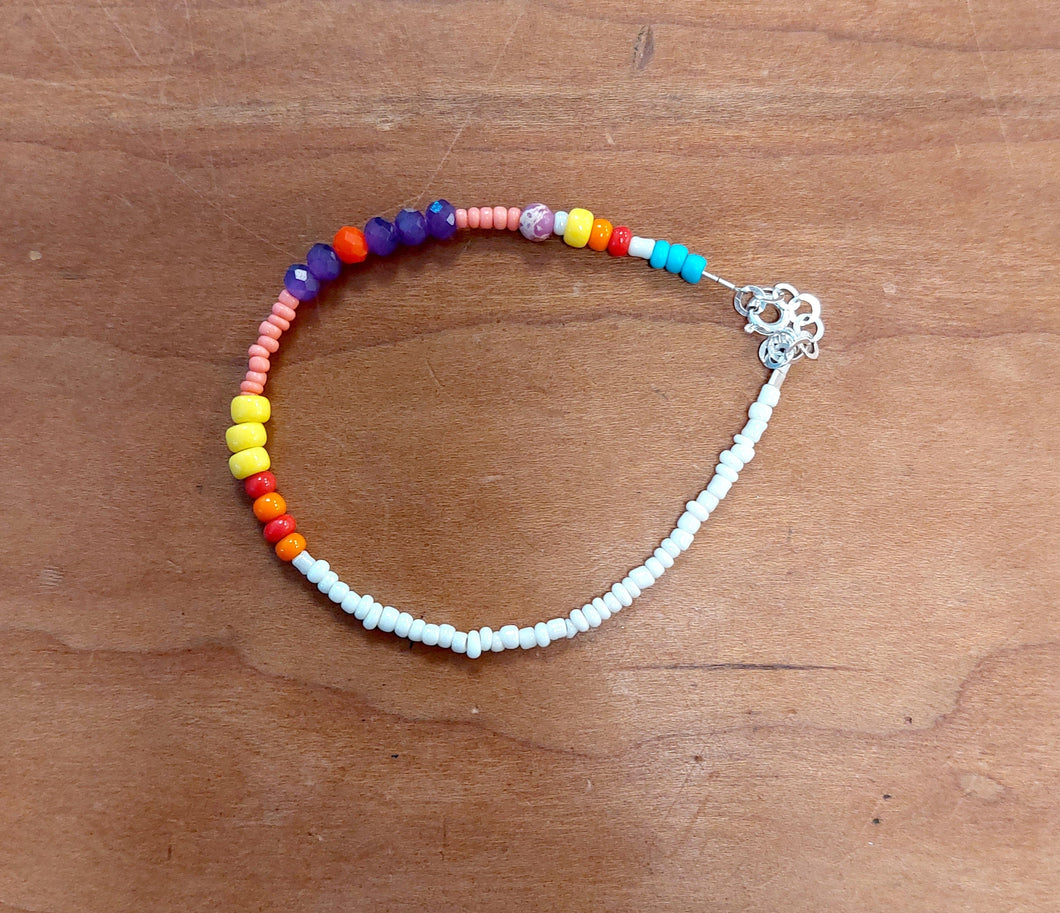 Bead bracelet half white and pink and purple