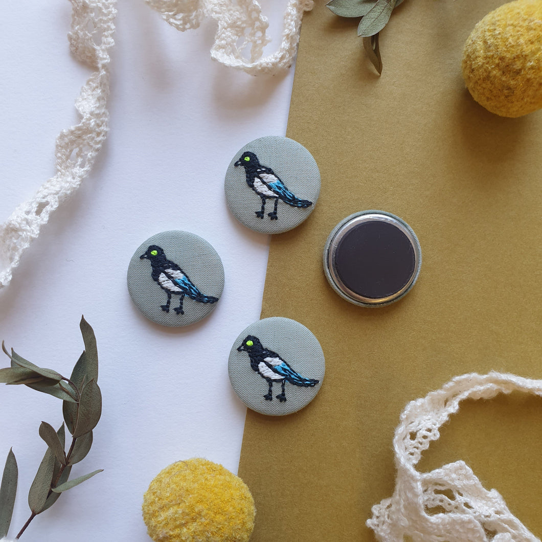 Magpie embroidered fridge magnet