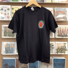 Load image into Gallery viewer, A Black Tshirt with a Free Palestine Melon print

