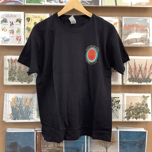 A Black Tshirt with a Free Palestine Melon print

