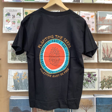 Load image into Gallery viewer, Planting The Seeds T-Shirt. - Fundraiser for Palestine
