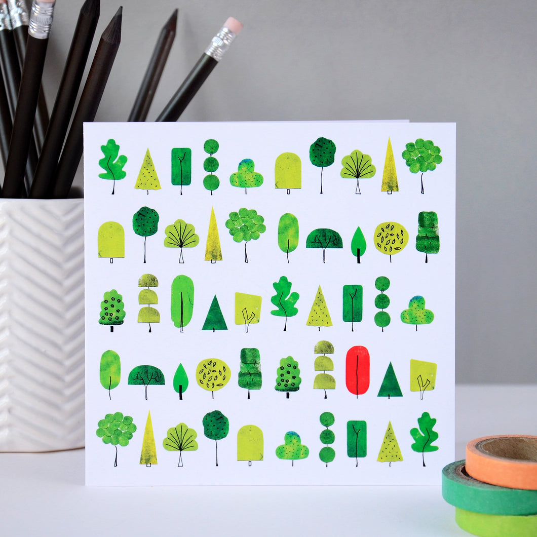 Orange tree and green trees Card